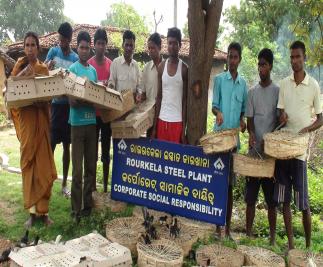 Beneficiaries with poultry chicks